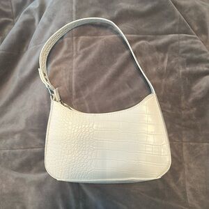 white leather purse